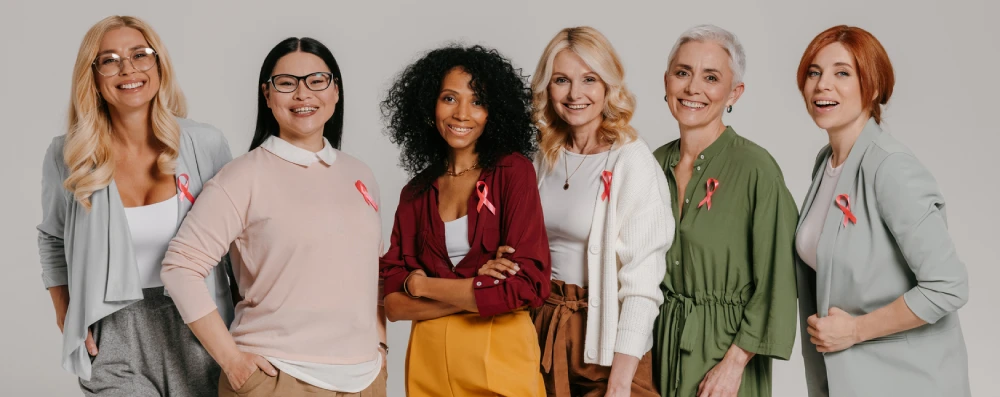 women wearing breast cancer ribbons