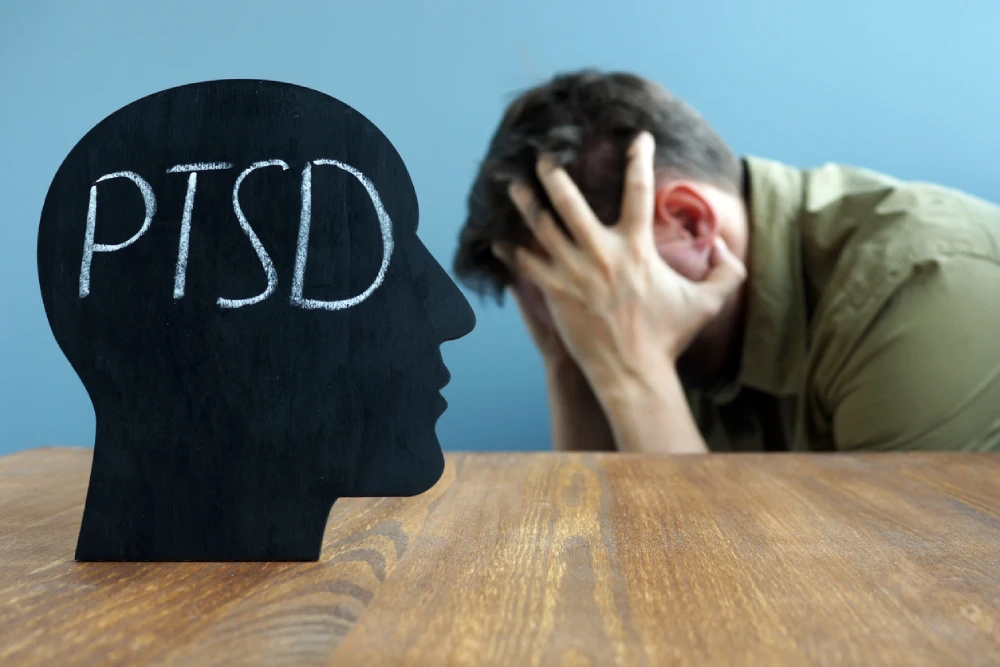 man experiencing PTSD symptoms