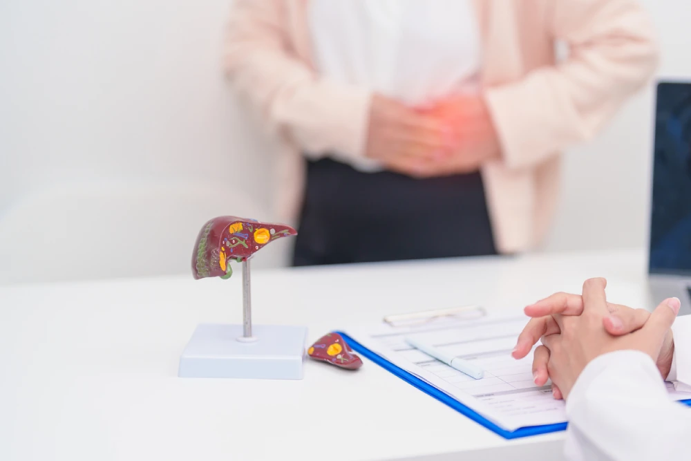 woman talking to her doctor about hepatitis