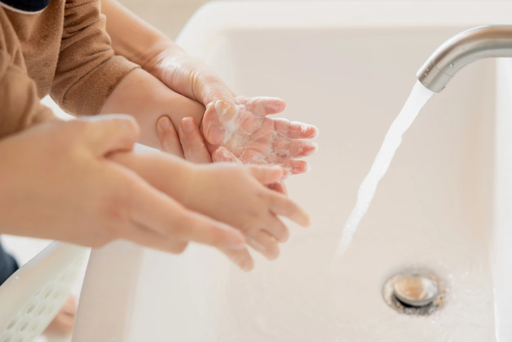 baby washing their hands