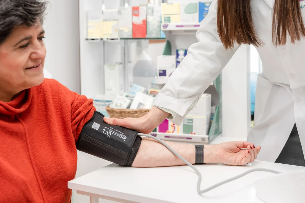 pharmacy wellness service - blood pressure monitoring using a blood pressure cuff