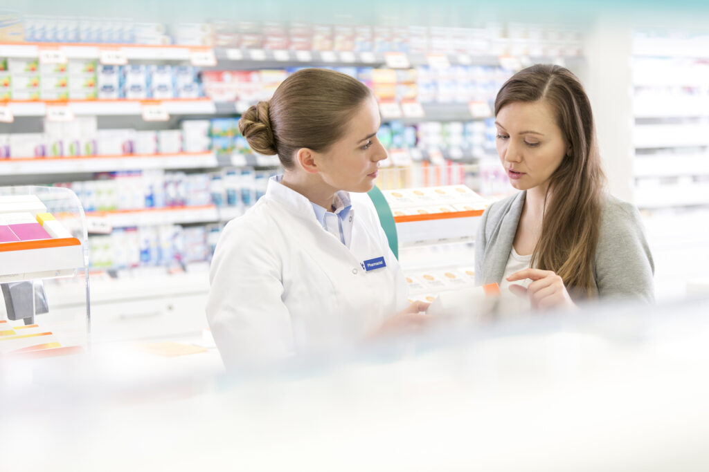 Understanding Birth Control Options in Canada 16 A female pharmacist discusses options with a young woman in the pharmacy
