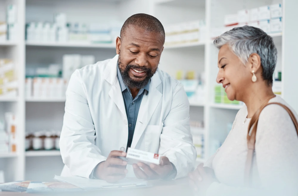 woman talking to her local pharmacist about quitting smoking aids