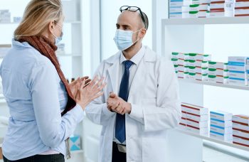 pharmachoice pharmacist with customer